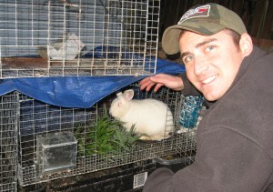 Craig feeding bamboo leaves to the rabbits