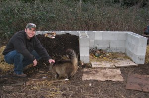 craig with compost pile and cat