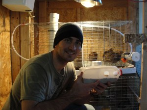 sustainable craig with the quail feeder prototype