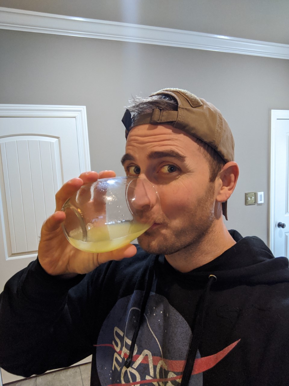 sustainablecraig drinking green apple juice